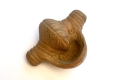 CLAY BEAD IN THE FORM OF A CONCH